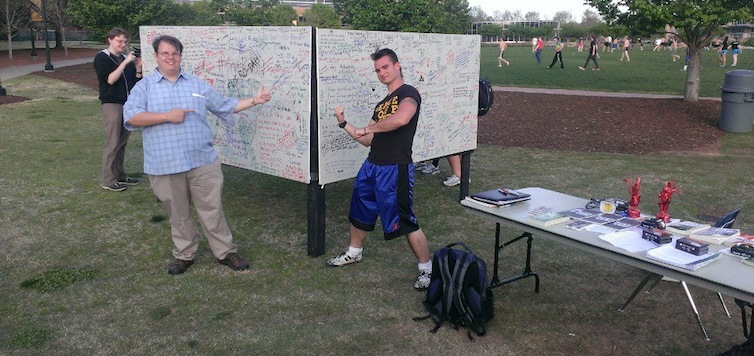 Students in front of a free speech wall