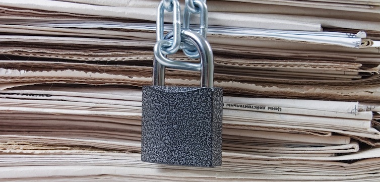 locked-newspaper-censorship-shutterstock-feat