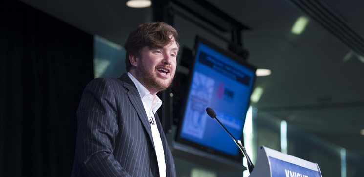 Greg-speaking-newseum-feat