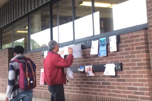 Staff members at RPI have been repeatedly captured on camera tearing down “Save the Union” flyers before prospective students, parents, or donors visit campus. (Credit: Save the Union / YouTube)